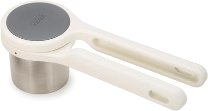 Potato masher, ergonomically designed, with a twist-action manual mechanism, made of stainless steel, suitable for making mashed potatoes and vegetable purées, stainless steel